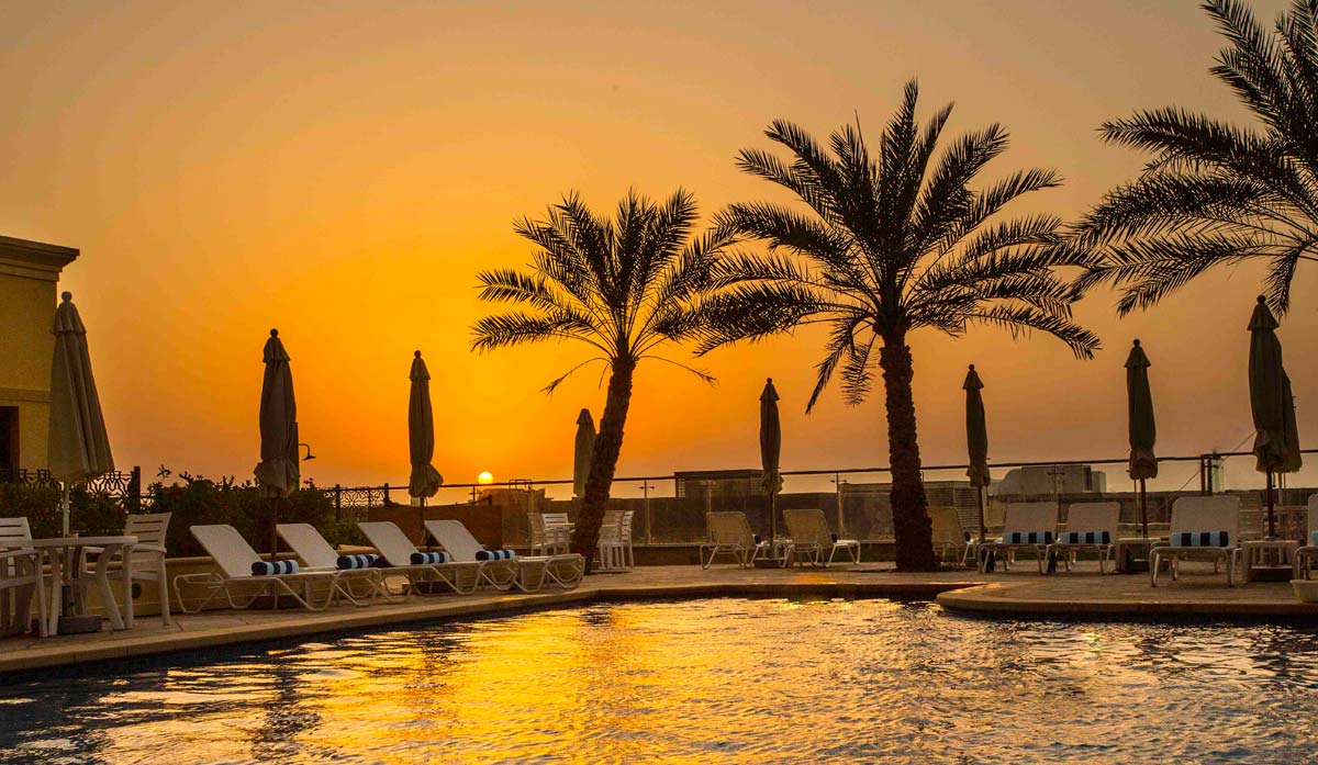 Outdoor swimming pool with spectacular views at sunset
